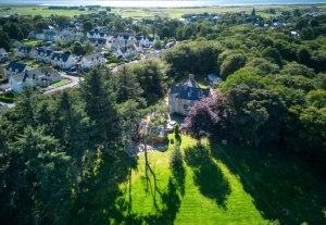 Drone shot shows Golf Course and Cathedral in background