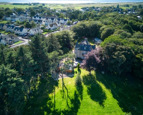 Drone shot shows Golf Course and Cathedral in background